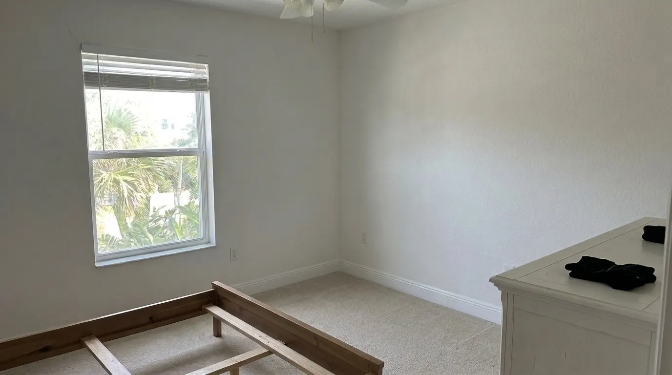 Same bedroom wall clean and freshly painted after mold remediation